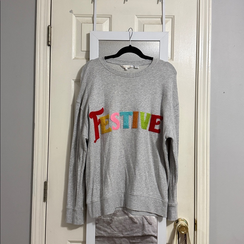 A cute colorful holiday sweater to wear for the holidays!